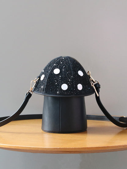 Bolso bandolera con forma de hongo y diamantes