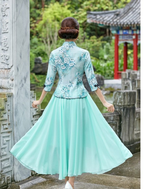 Top cheongsam chino clásico y elegante