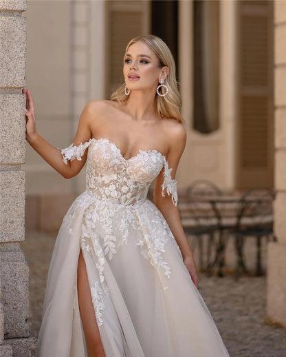 Exquisito vestido de novia de cola de pez con encaje blanco