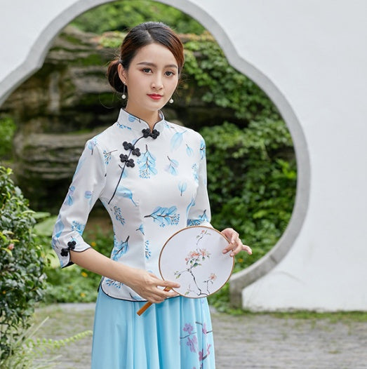 Top cheongsam chino clásico y elegante