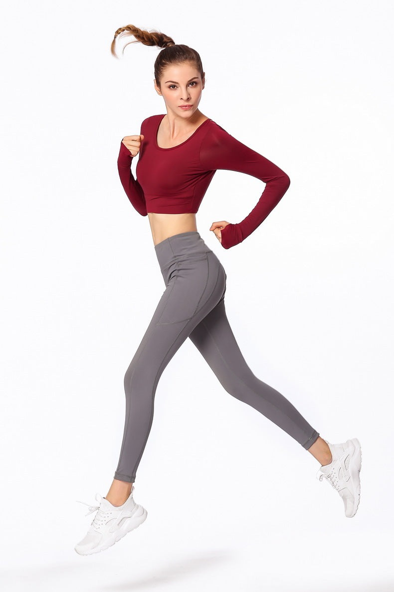 Ropa deportiva de fitness con espalda cruzada y mangas largas