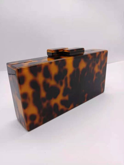 Bernsteinfarbene Acryltasche mit Leopardenmuster und Bankett-Clutch