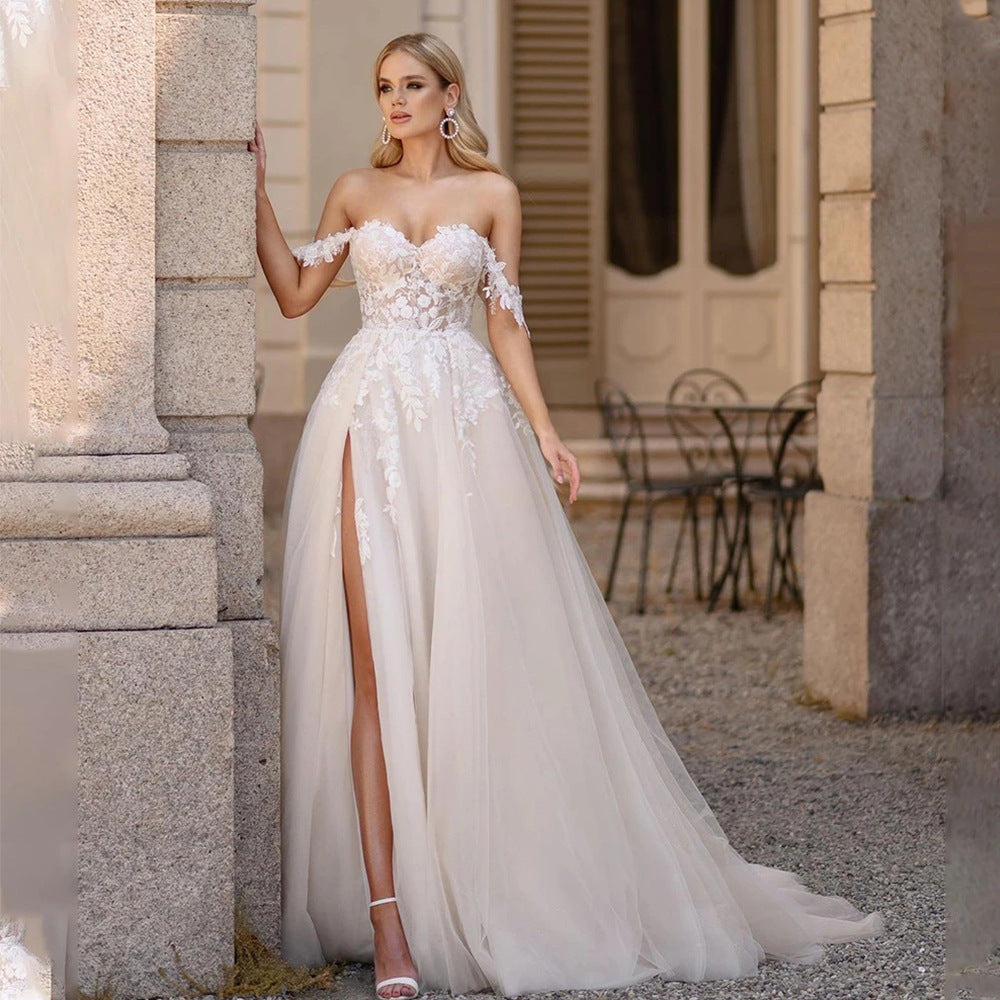 Exquisito vestido de novia de cola de pez con encaje blanco