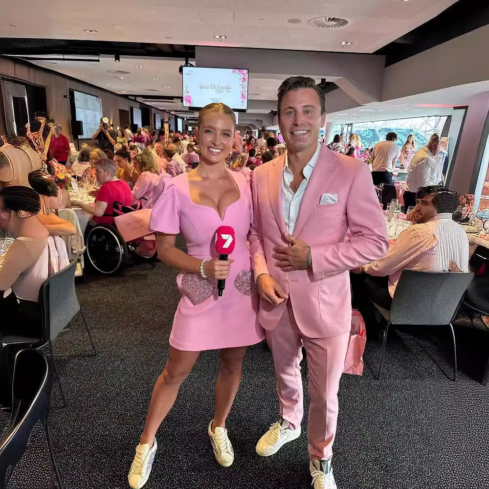 Ropa de mujer con escote en V, mangas abullonadas y lentejuelas en color rosa